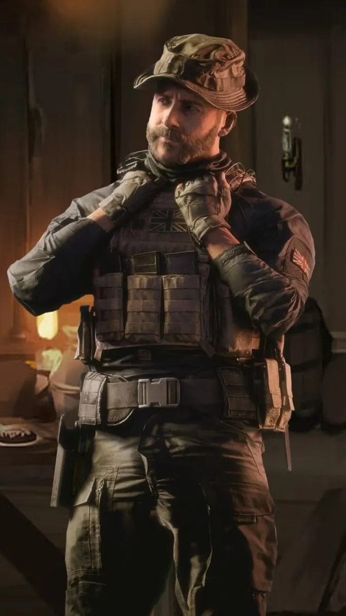 Captain Price dengan perlengkapan taktis dan topi boonie dengan patch bendera Inggris di dada dan bahunya