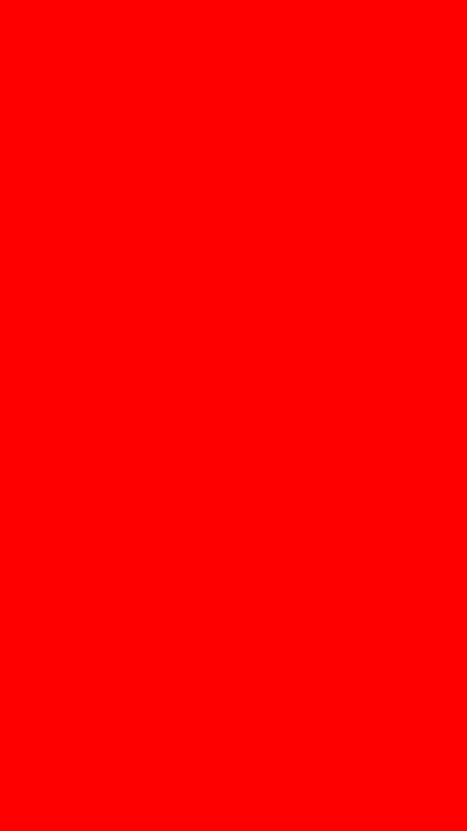 Un bloc uni et solide de couleur rouge vif remplissant tout le cadre.